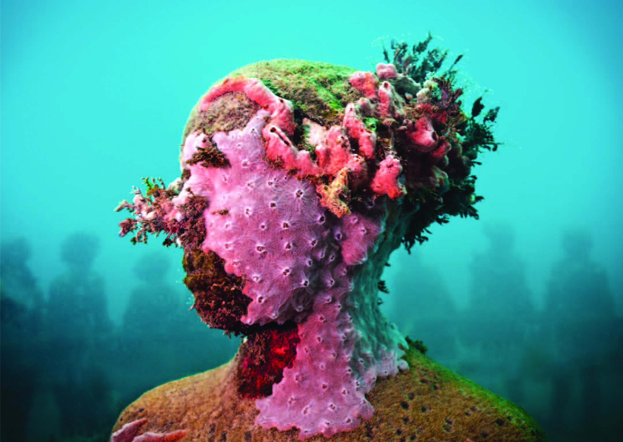 Taylors beelden zijn van cement en bevorderen de ontwikkeling van koralen. © Jason deCaires Taylor Taylors beelden zijn van cement en bevorderen de ontwikkeling van koralen. © Jason deCaires Taylor
