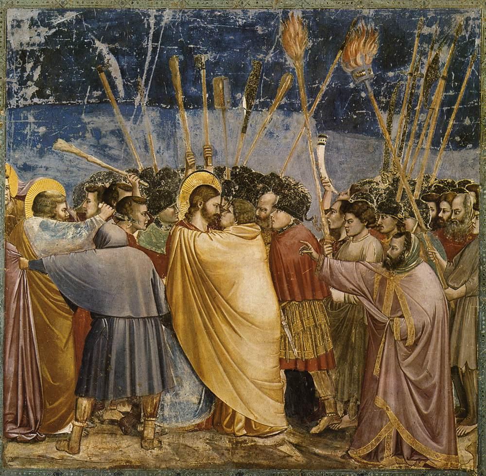 Judas, de 13de leerling, verraadt Jezus met een kus. Schilderij van Giotto di Bondone. © WikiCommons Judas, de 13de leerling, verraadt Jezus met een kus. Schilderij van Giotto di Bondone. © WikiCommons