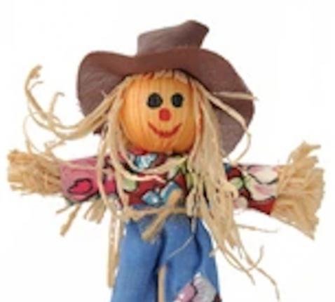 Smiling Scarecrow Isolated On White Background © Dreamstime.com