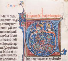 Aapjes houden een steekspel in de verluchte eerste letter van boek Jesaja. Archief Grootseminarie Brugge, Ms. 5/191, fol. 25v.  © stad Brugge