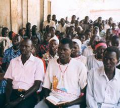 Sudanese christenen in gebed © CSW