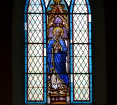 Glasraam in de Sint-Antonius Abtkerk van Moerbeke © Geert Defauw