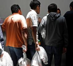 Guatemalteekse migranten bij aankomst in de VS op 12 juli 2019 © VaticanNews