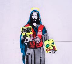 Great Malborough Street in Londen, Jezus als verkoper van de daklozenkrant The Big Issue. © Tee Cee (CC Flickr)