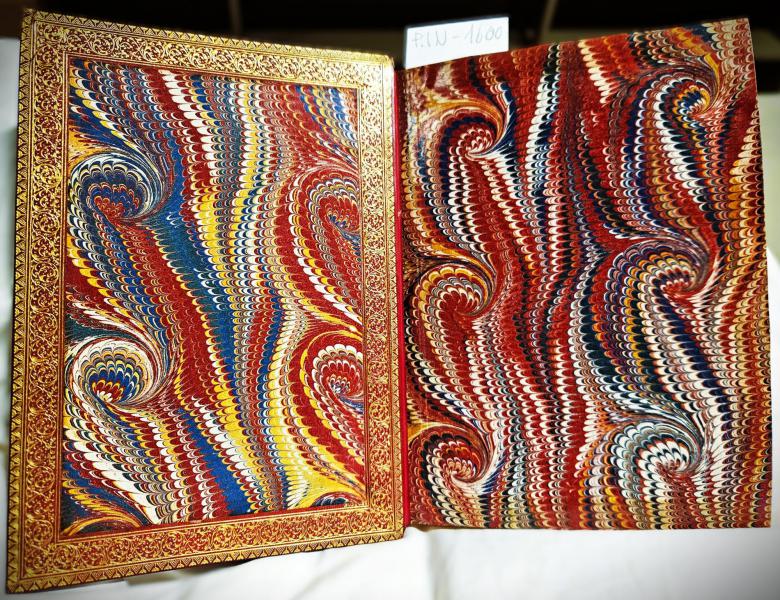 Gemarmerde schutbladen met bladgoud randversiering © Bibliotheek Grootseminarie