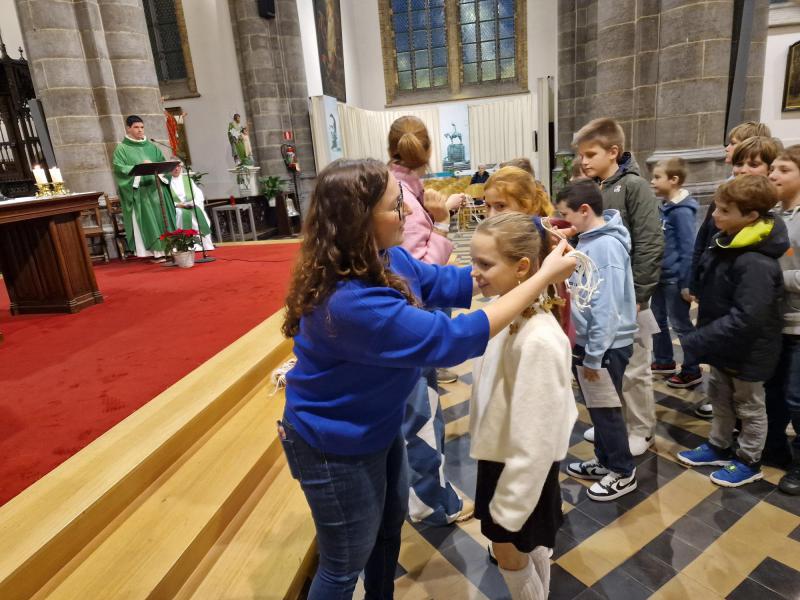 Kruisoplegging © Thierry Christiaens