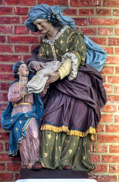 Beeld van de H. Anna, die haar dochter H. Maria onderricht in het Oude Testament 