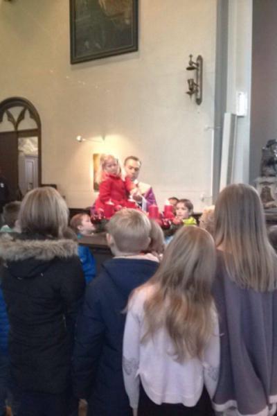 Aansteken van de tweede kaars 