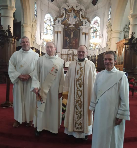 diaken Hubert, pastoor Marc, diaken Luc en diaken Jan 
