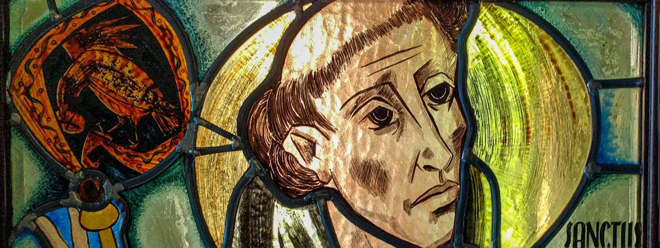 Brieven aan Benedictus, onze patroonheilige. Glasraam in een deur van de abdij in Affligem 