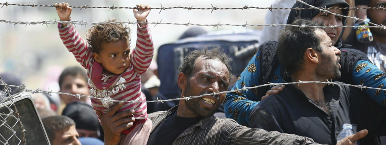 Vluchtelingen aan de grens met Turkije