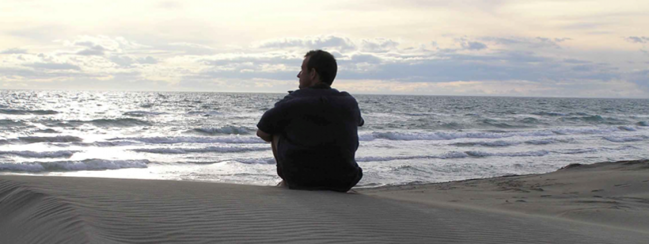 vader op strand 