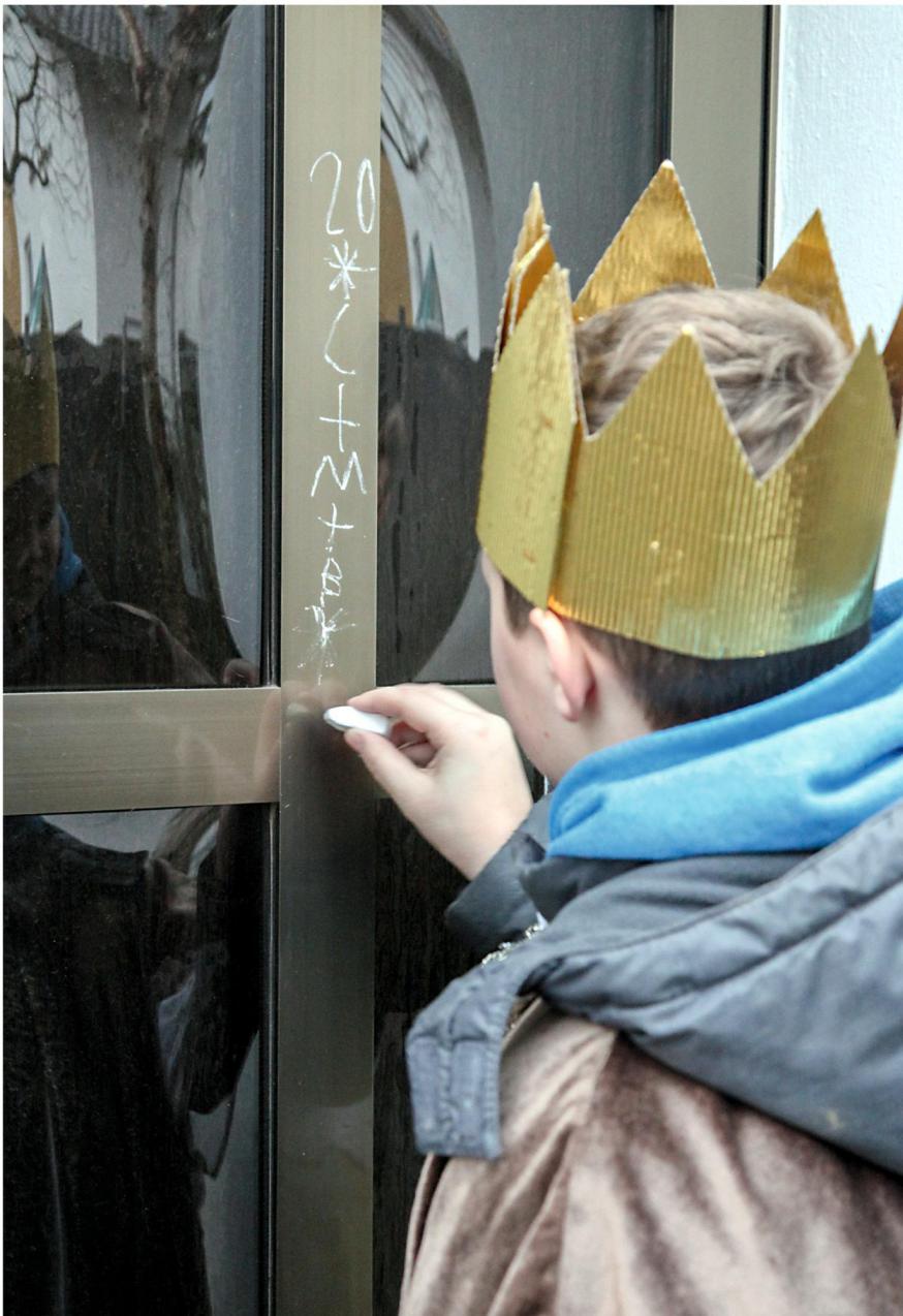 Huiszegen op de voordeurpost 