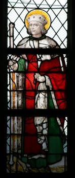 Gummarus als edele op een glasraam in de kooromgang van de Sint-Gummaruskerk Gummarus als edele op een glasraam in de kooromgang van de Sint-Gummaruskerk