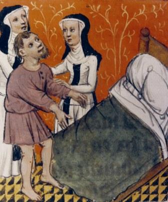 Twee zusters verzorgen een zieke. Bron: Doornik, Kathedraalarchief.