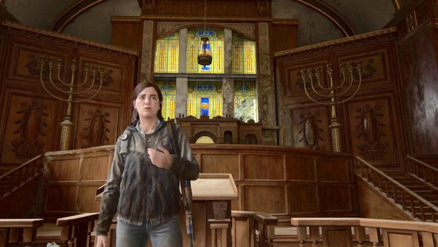 In het populaire game The Last of Us Part II krijgt het hoofdpersonage 20 minuten uitleg over het jodendom in een vervallen synagoge © LL/Tertio In het populaire game The Last of Us Part II krijgt het hoofdpersonage 20 minuten uitleg over het jodendom in een vervallen synagoge © LL/Tertio
