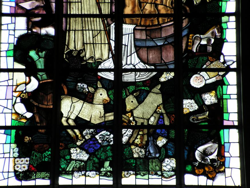 Detail glasraam Sint-Niklaas in de kerk in Dessel. © Luc Damen